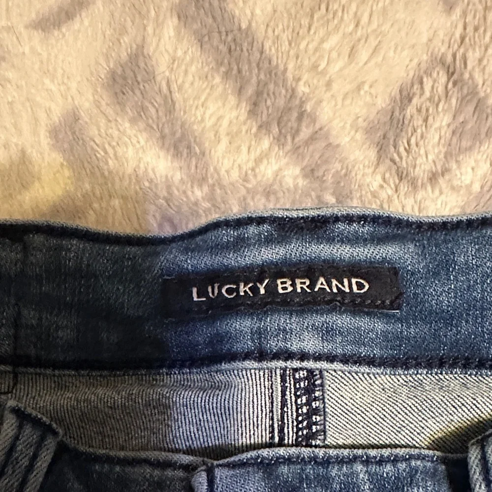 A87.  Lucky Brand Blue Straight Leg Jeans